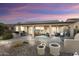 Spacious covered patio with built-in BBQ and comfortable seating at 3171 N 159Th Ave, Goodyear, AZ 85395