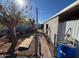 Large backyard with storage sheds and a walkway at 364 S Winterhaven --, Mesa, AZ 85204