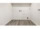 Laundry area with gray floor and hookups at 3705 N Algodon Dr, Eloy, AZ 85131