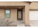 Front entrance with a white door and sidelights at 3715 N Algodon Dr, Eloy, AZ 85131