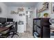 Home office with wood desk and built-in shelving at 4007 N 87Th St, Scottsdale, AZ 85251