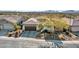 Single-story home with mountain views and desert landscaping at 41933 N Crooked Stick Rd, Anthem, AZ 85086