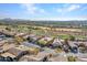 Aerial view showcasing the property's location in a desirable golf course community at 41933 N Crooked Stick Rd, Anthem, AZ 85086