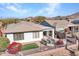 Backyard with patio, firepit, and mountain views at 41933 N Crooked Stick Rd, Anthem, AZ 85086