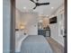 Cozy bedroom with a comfortable bed and adjacent kitchenette at 41933 N Crooked Stick Rd, Anthem, AZ 85086