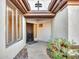 Front courtyard with stone flooring and potted plants at 41933 N Crooked Stick Rd, Anthem, AZ 85086
