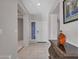 Bright entryway with tile floors and a decorative console table at 41933 N Crooked Stick Rd, Anthem, AZ 85086