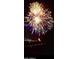 Brilliant fireworks light up night sky at 41933 N Crooked Stick Rd, Anthem, AZ 85086