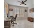 Bright home office with window shutters and built-in desk at 41933 N Crooked Stick Rd, Anthem, AZ 85086