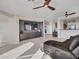 Living room features a built-in media wall and large format tile at 41933 N Crooked Stick Rd, Anthem, AZ 85086