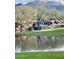 Serene pond and waterfall landscape at 41933 N Crooked Stick Rd, Anthem, AZ 85086