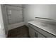 A clean, bright bathroom with a shower-tub combination and a modern vanity sink at 4353 E Bradford Ave, San Tan Valley, AZ 85140