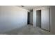 A well-lit bedroom with a closet and a doorway for versatile space usage at 4353 E Bradford Ave, San Tan Valley, AZ 85140
