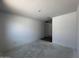 A spacious bedroom with neutral walls and natural lighting, creating a serene atmosphere at 4353 E Bradford Ave, San Tan Valley, AZ 85140