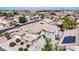 Aerial view of a two-story house with solar panels and a landscaped yard at 4628 W Hasan Dr, Laveen, AZ 85339