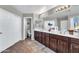 Primary bathroom with double vanity and separate toilet at 4628 W Hasan Dr, Laveen, AZ 85339