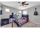 Bedroom with a computer setup and a bed at 4628 W Hasan Dr, Laveen, AZ 85339