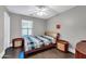 Bright bedroom with wood flooring and a double bed at 4628 W Hasan Dr, Laveen, AZ 85339