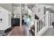 Two-story entryway with staircase and wood floors at 4628 W Hasan Dr, Laveen, AZ 85339