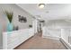 Upstairs hallway with built-in shelving and access to bedrooms at 4628 W Hasan Dr, Laveen, AZ 85339