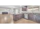Kitchen with a center island, stainless steel appliances, and a sink near the window at 4628 W Hasan Dr, Laveen, AZ 85339