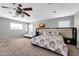 Spacious main bedroom with a king-size bed and seating area at 4628 W Hasan Dr, Laveen, AZ 85339