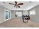 Home office with desk, window, and ceiling fan at 4628 W Hasan Dr, Laveen, AZ 85339