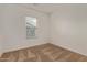 Well-lit bedroom with neutral walls and carpeted floors at 4707 S Vapor Dr, Mesa, AZ 85212