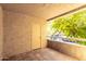 Private balcony with tiled flooring and view of trees at 5102 N 31St Pl # 422, Phoenix, AZ 85016