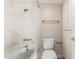 Bathroom with shower/tub combo and marble tile at 5102 N 31St Pl # 422, Phoenix, AZ 85016