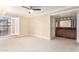 Bedroom with tile flooring, window, and access to bathroom at 5102 N 31St Pl # 422, Phoenix, AZ 85016