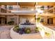 Community courtyard with fountain and desert landscaping at 5102 N 31St Pl # 422, Phoenix, AZ 85016