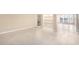 Bright living room with tile floors and built-in shelving at 5102 N 31St Pl # 422, Phoenix, AZ 85016