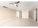 Living room with tile floors and sliding glass door at 5102 N 31St Pl # 422, Phoenix, AZ 85016