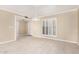 Living room with tile floors and window with shutters at 5102 N 31St Pl # 422, Phoenix, AZ 85016