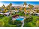 Community pool and lush landscaping with mountain views at 5652 N Scottsdale Rd, Paradise Valley, AZ 85253