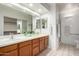 Bathroom with double vanity and walk-in shower at 5830 E Mckellips Rd # 100, Mesa, AZ 85215