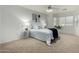 Bright bedroom with a queen-size bed and large windows at 5830 E Mckellips Rd # 100, Mesa, AZ 85215