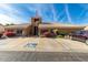 Community center exterior with parking and landscaping at 5830 E Mckellips Rd # 100, Mesa, AZ 85215