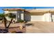 Two-car garage with a spacious driveway at 5830 E Mckellips Rd # 100, Mesa, AZ 85215