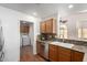 Kitchen with stainless steel appliances and laundry access at 5830 E Mckellips Rd # 100, Mesa, AZ 85215