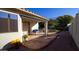 Covered patio with seating area and desert landscaping at 5830 E Mckellips Rd # 100, Mesa, AZ 85215