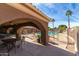 Relaxing pool area with covered patio and tables at 5830 E Mckellips Rd # 100, Mesa, AZ 85215