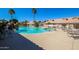 Inviting community pool with lounge chairs at 5830 E Mckellips Rd # 100, Mesa, AZ 85215