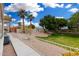 Landscaped side yard with a grassy area and walkway at 5830 E Mckellips Rd # 100, Mesa, AZ 85215