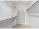 Spacious walk-in closet with double hanging rods and shelving at 5830 E Mckellips Rd # 100, Mesa, AZ 85215