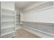 Large walk-in closet with shelving and hanging rods at 5830 E Mckellips Rd # 100, Mesa, AZ 85215