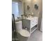 Clean bathroom with modern white vanity at 6307 E Gelding Dr, Scottsdale, AZ 85254