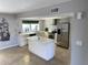 Modern kitchen with stainless steel appliances and an island at 6307 E Gelding Dr, Scottsdale, AZ 85254