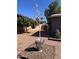 Modern metal agave sculpture in a gravel garden bed at 6307 E Gelding Dr, Scottsdale, AZ 85254